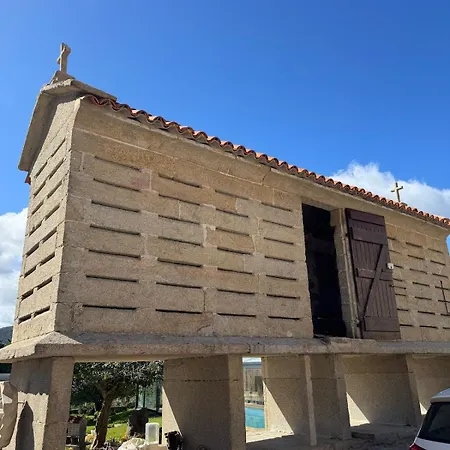 Con Piscina Cubierta Rianjo
